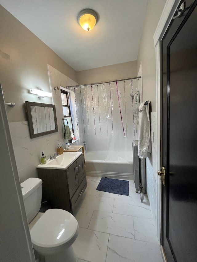 5110 S Woodlawn Ave Unit 3H, Chicago, IL 60615 - full bath featuring shower / tub combo with curtain, marble look tile flooring, toilet, and vanity