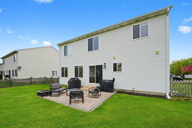 14530 General Dr, Plainfield, IL 60544 - back of property with an outdoor fire pit and a patio