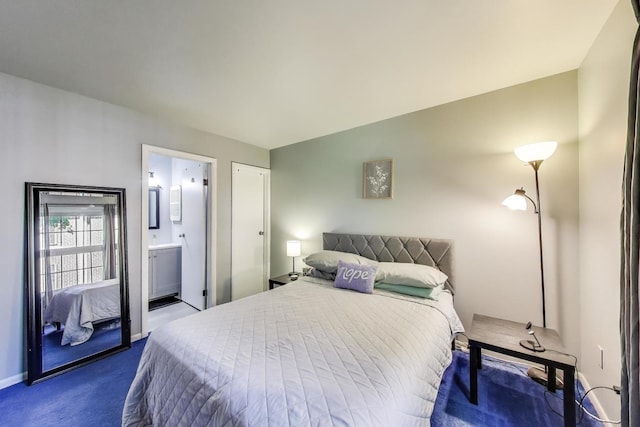 501 Coventry Ln Unit 3, Crystal Lake, IL 60014 - bedroom with dark carpet, connected bathroom, and baseboards