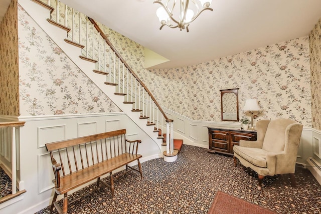 501 Coventry Ln Unit 3, Crystal Lake, IL 60014 - sitting room featuring wainscoting, stairs, wallpapered walls, a chandelier, and a decorative wall