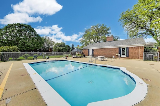 501 Coventry Ln Unit 3, Crystal Lake, IL 60014 - community pool with a patio area