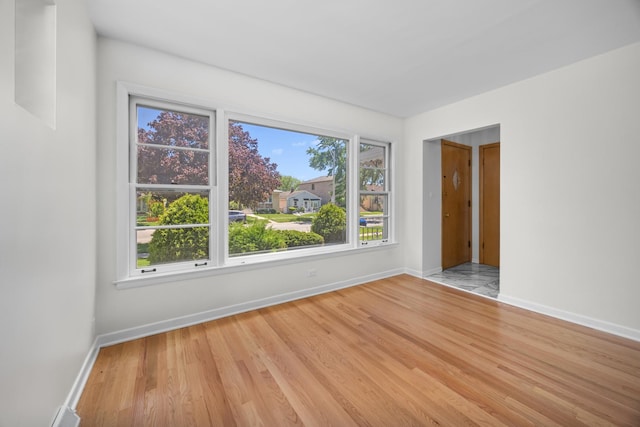 4316 N Sayre Ave, Norridge, IL 60706 - empty room featuring wood finished floors and baseboards