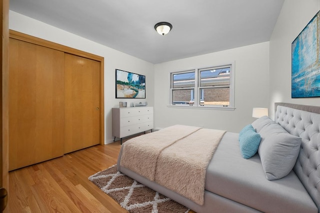 4316 N Sayre Ave, Norridge, IL 60706 - bedroom with light wood-style flooring and a closet