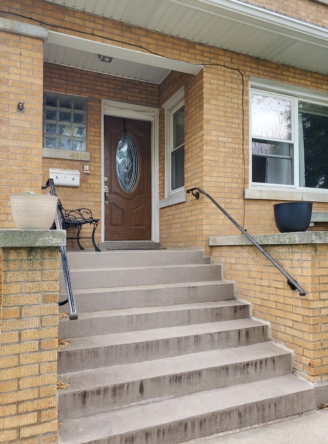 4510 N Menard Ave, Chicago, IL 60630 - property entrance featuring brick siding