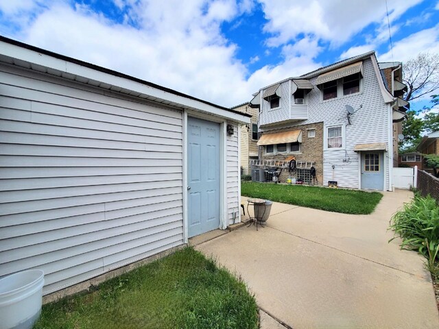 4510 N Menard Ave, Chicago, IL 60630 - rear view of house featuring a patio area