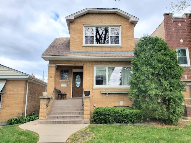 4510 N Menard Ave, Chicago, IL 60630 - view of front of house featuring brick siding and a shingled roof