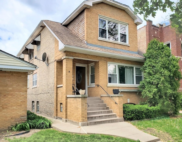 4510 N Menard Ave, Chicago, IL 60630 - view of front of house with brick siding and a shingled roof