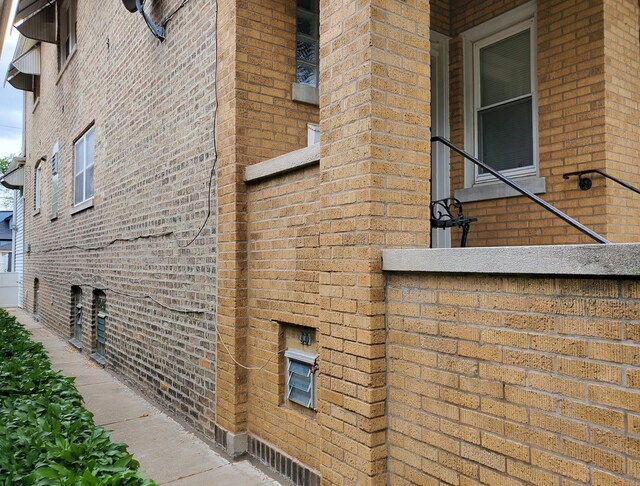 4510 N Menard Ave, Chicago, IL 60630 - view of side of home featuring brick siding