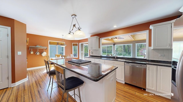 2653 Clara Ave, Aurora, IL 60502 - kitchen featuring stainless steel appliances, a sink, healthy amount of natural light, backsplash, and recessed lighting