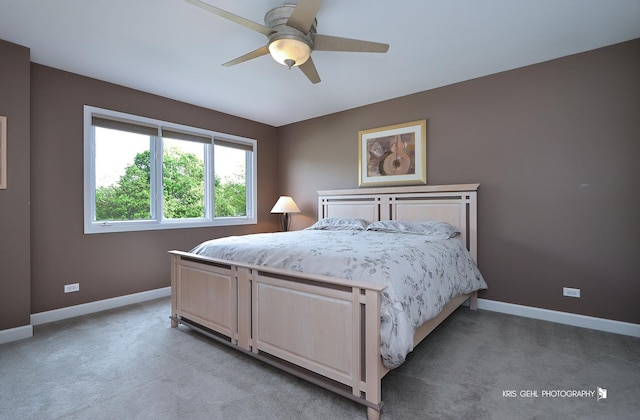 2653 Clara Ave, Aurora, IL 60502 - bedroom with light carpet, baseboards, and ceiling fan
