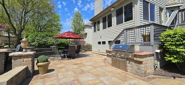 2653 Clara Ave, Aurora, IL 60502 - view of patio featuring an outdoor kitchen, outdoor dining area, and a grill