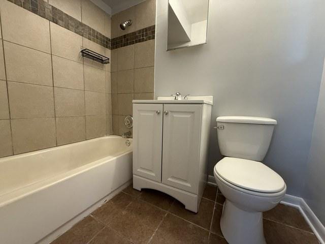 39 King Arthur Ct Unit 10, Northlake, IL 60164 - bathroom with tile patterned flooring, toilet, shower / bath combination, vanity, and baseboards