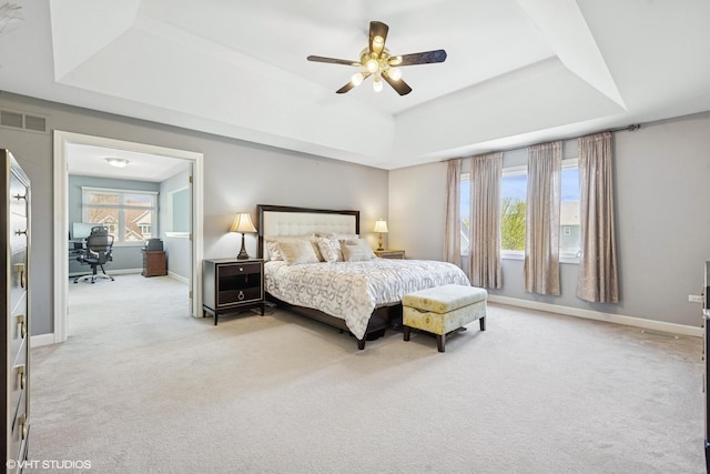 4276 Colton Cir, Naperville, IL 60564 - bedroom with a raised ceiling, carpet floors, baseboards, an office area, and a ceiling fan