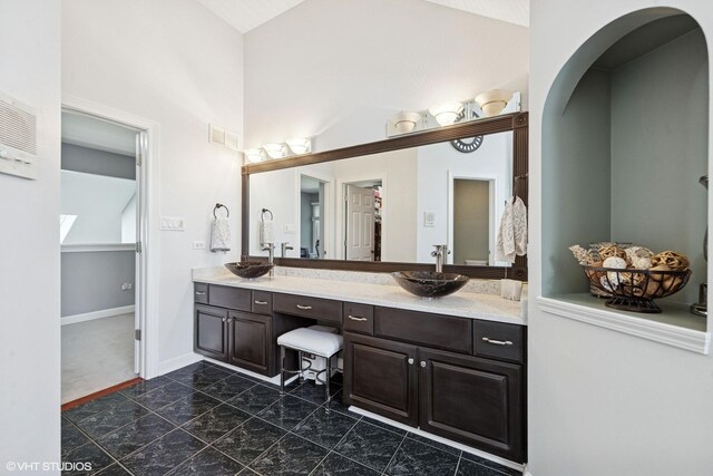 4276 Colton Cir, Naperville, IL 60564 - full bathroom with double vanity, lofted ceiling, and baseboards