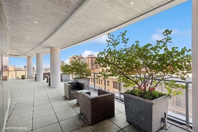 303 W Ohio St Unit 1509, Chicago, IL 60654 - view of patio featuring a balcony