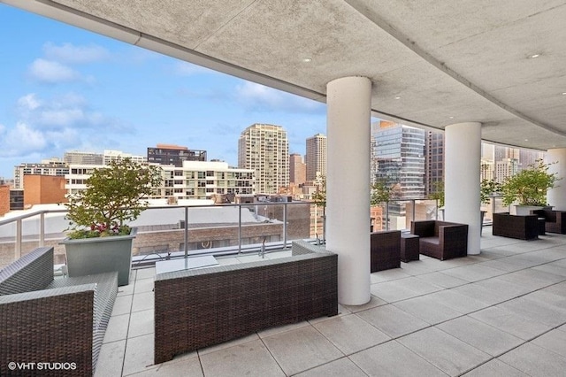 303 W Ohio St Unit 1509, Chicago, IL 60654 - view of patio with a balcony, a view of city, and an outdoor living space