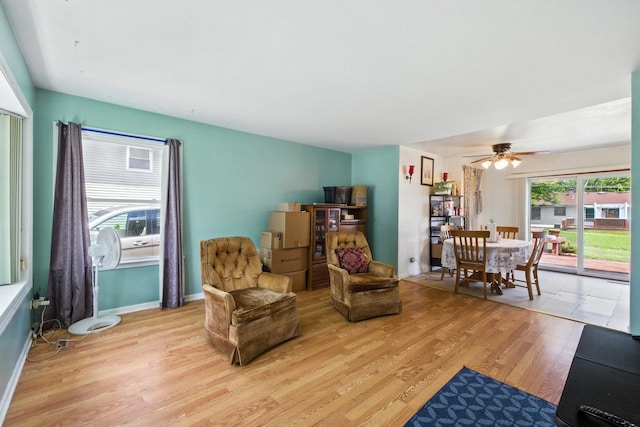 1724 Sycamore Ave, Hanover Park, IL 60133 - living area featuring light wood-type flooring and a ceiling fan