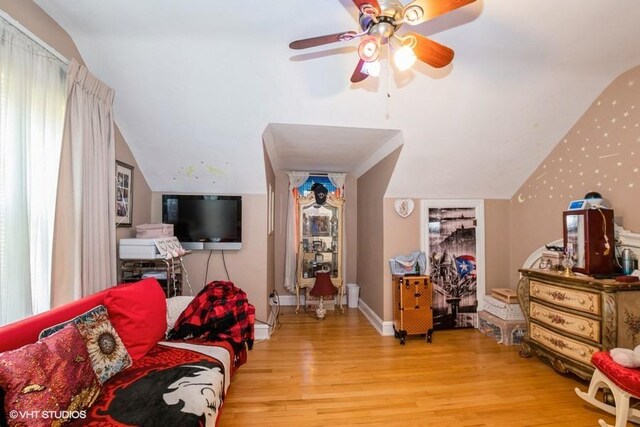 9230 S Saint Louis Ave, Evergreen Park, IL 60805 - living area featuring wood finished floors, ceiling fan, lofted ceiling, and baseboards