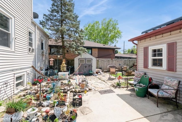 9230 S Saint Louis Ave, Evergreen Park, IL 60805 - view of patio featuring a shed, fence, and an outbuilding