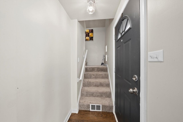 9656 S Utica Ave, Evergreen Park, IL 60805 - staircase with wood finished floors and baseboards