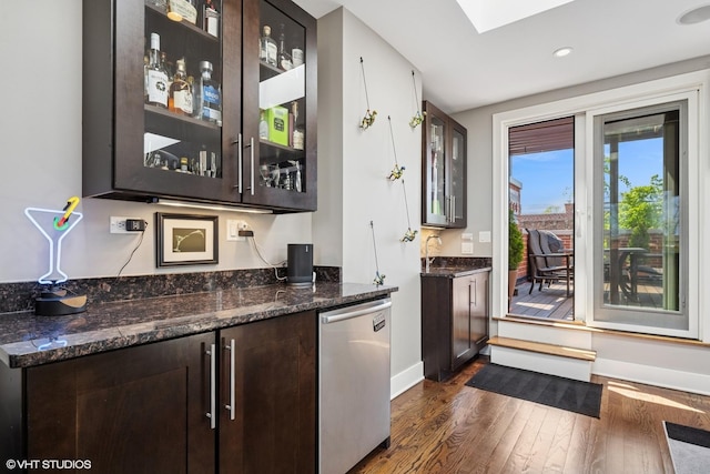 bar with dishwasher, dark wood-style floors, a skylight, baseboards, and recessed lighting