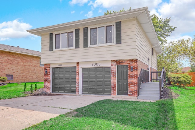 18008 Crawford Ave, Country Club Hills, IL 60478 - view of front facade featuring brick siding, a garage, a front lawn, and driveway