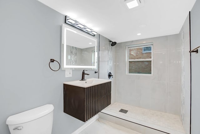 18008 Crawford Ave, Country Club Hills, IL 60478 - bathroom featuring toilet, vanity, and a tile shower