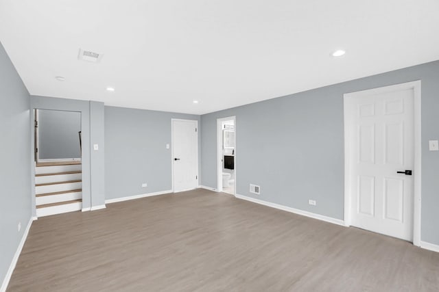 18008 Crawford Ave, Country Club Hills, IL 60478 - empty room featuring wood finished floors, baseboards, stairway, and recessed lighting
