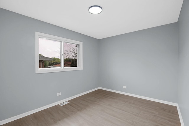 18008 Crawford Ave, Country Club Hills, IL 60478 - spare room with wood finished floors and baseboards