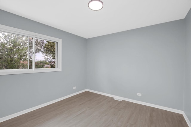 18008 Crawford Ave, Country Club Hills, IL 60478 - spare room with wood finished floors and baseboards