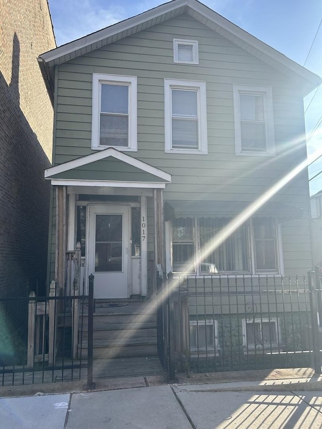 view of front of property with a fenced front yard