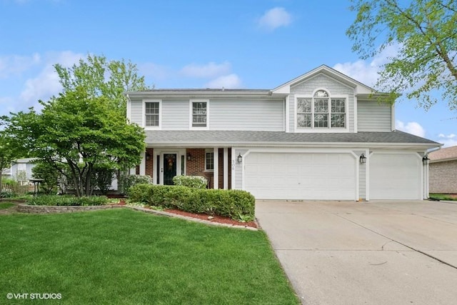506 Rodney St, Lockport, IL 60441 - traditional home with an attached garage, concrete driveway, and a front lawn
