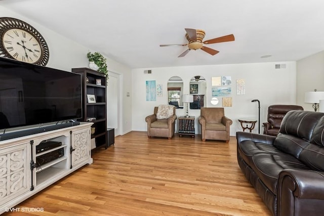 506 Rodney St, Lockport, IL 60441 - living room featuring a ceiling fan and light wood finished floors