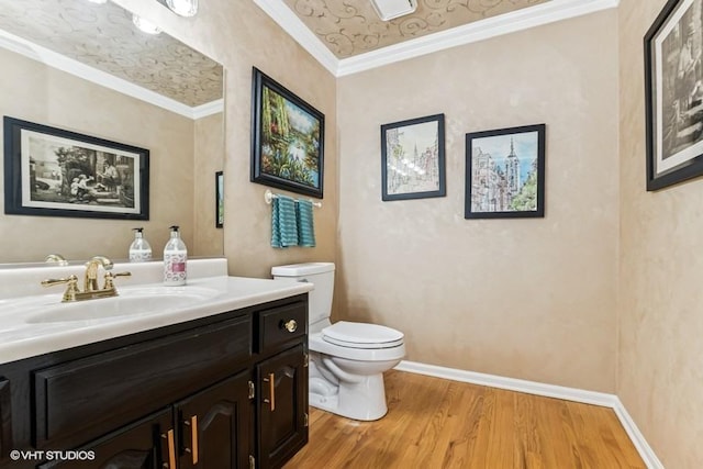 506 Rodney St, Lockport, IL 60441 - half bath featuring wood finished floors, toilet, vanity, ornamental molding, and baseboards