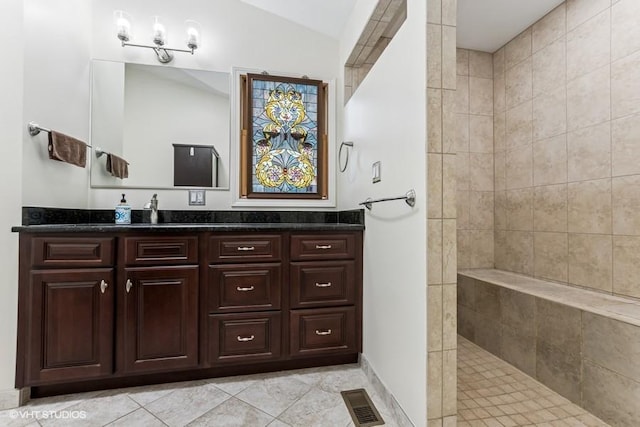 506 Rodney St, Lockport, IL 60441 - bathroom with a walk in shower, vanity, and baseboards