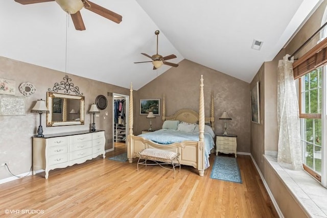 506 Rodney St, Lockport, IL 60441 - bedroom featuring light wood finished floors, lofted ceiling, a spacious closet, ceiling fan, and a closet