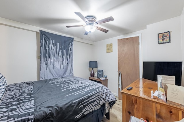 7426 W 64th St, Summit, IL 60501 - bedroom with light wood-style floors and a ceiling fan