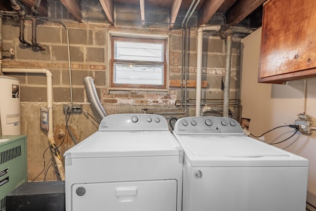 7426 W 64th St, Summit, IL 60501 - clothes washing area featuring washing machine and dryer and cabinet space