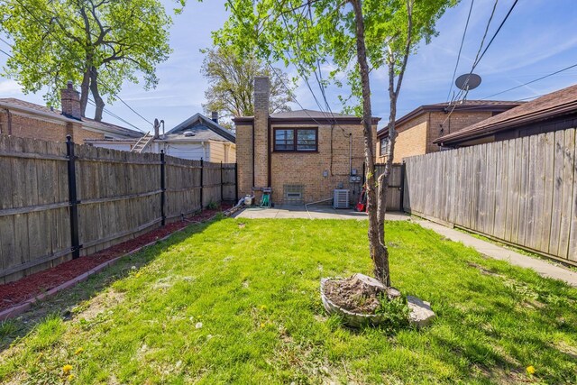 7426 W 64th St, Summit, IL 60501 - view of yard with cooling unit and a patio area