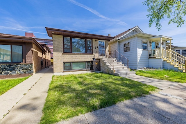 7426 W 64th St, Summit, IL 60501 - view of front of home with brick siding and a front yard