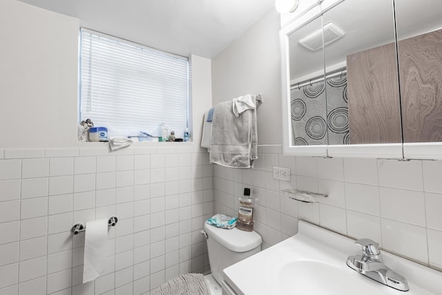 7426 W 64th St, Summit, IL 60501 - full bath with tile walls, toilet, curtained shower, and vanity