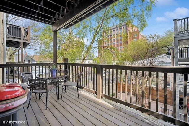 4444 N Wolcott Ave Unit 2A, Chicago, IL 60640 - wooden terrace with outdoor dining space