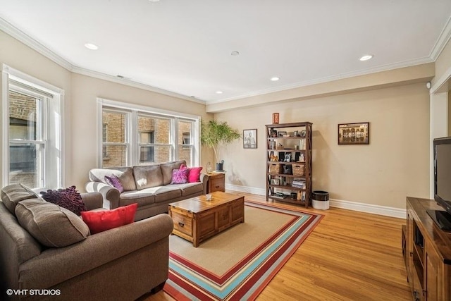4444 N Wolcott Ave Unit 2A, Chicago, IL 60640 - living area featuring light wood finished floors, ornamental molding, baseboards, and recessed lighting