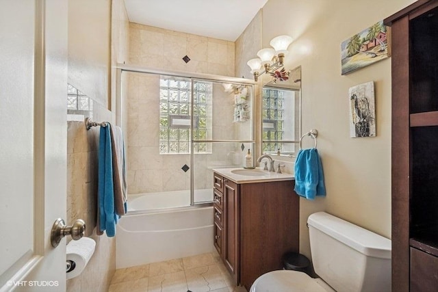 4444 N Wolcott Ave Unit 2A, Chicago, IL 60640 - full bathroom with toilet, vanity, shower / bath combination with glass door, and a chandelier
