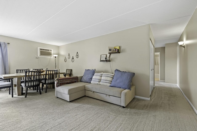 living area featuring carpet floors, a wall mounted air conditioner, and baseboards