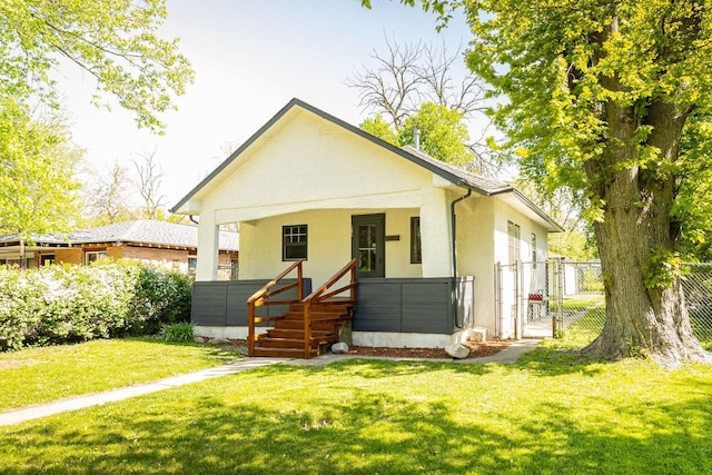 684 S Gordon Ave, Kankakee, IL 60901 - bungalow-style house featuring a gate, stucco siding, and a porch