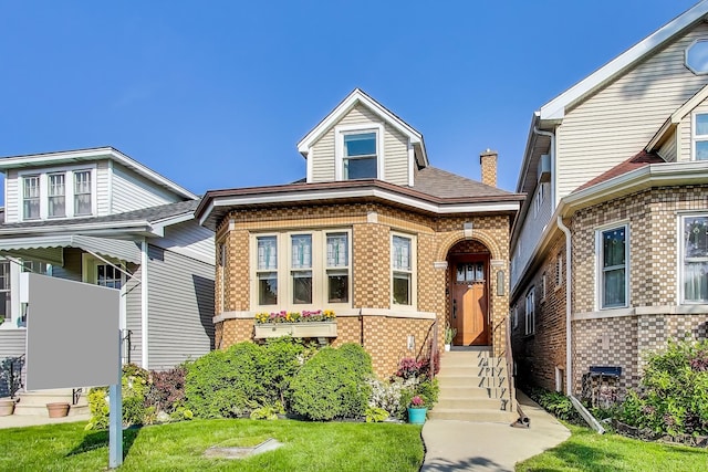 6167 N Naper Ave, Chicago, IL 60631 - view of front of property featuring brick siding and a front lawn