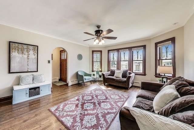 6167 N Naper Ave, Chicago, IL 60631 - living area with arched walkways, a baseboard radiator, crown molding, a ceiling fan, and wood finished floors
