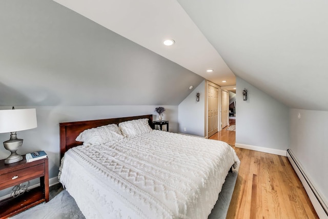 6167 N Naper Ave, Chicago, IL 60631 - bedroom with a baseboard radiator, lofted ceiling, baseboards, light wood-type flooring, and recessed lighting
