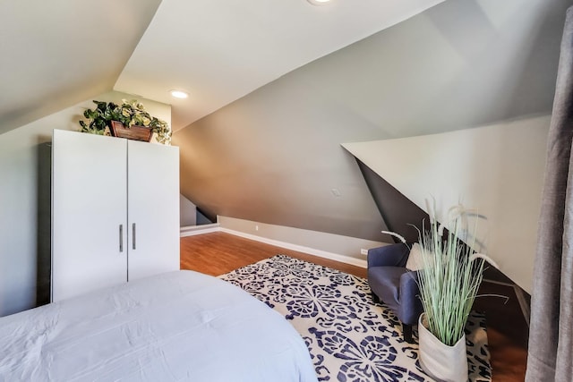 6167 N Naper Ave, Chicago, IL 60631 - bedroom with vaulted ceiling, wood finished floors, and recessed lighting